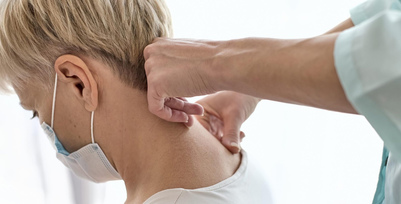 physiotherapist undergoing therapy with female patient scaled
